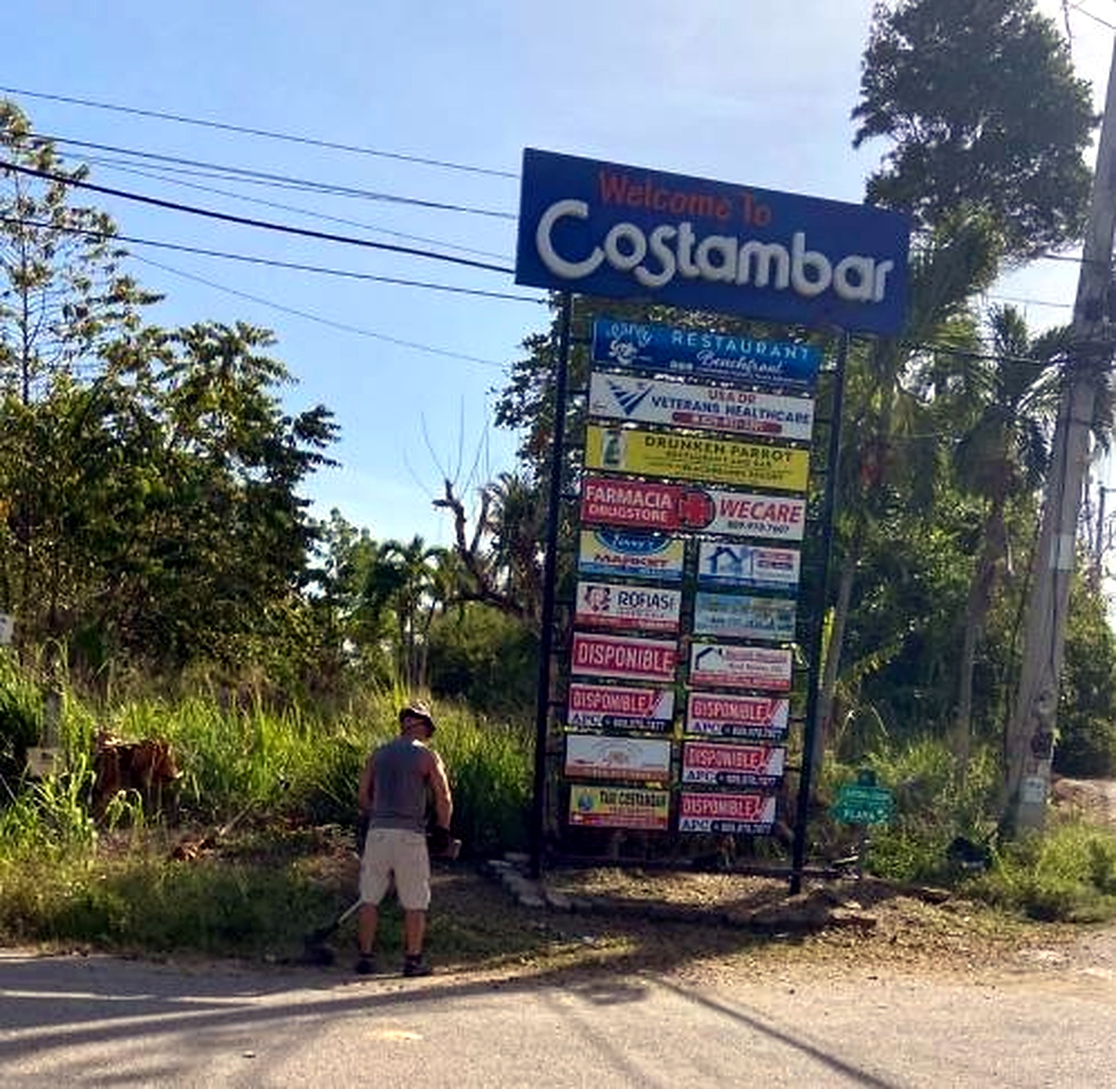 Welcome to Costambar advertising pylon after cleanup
